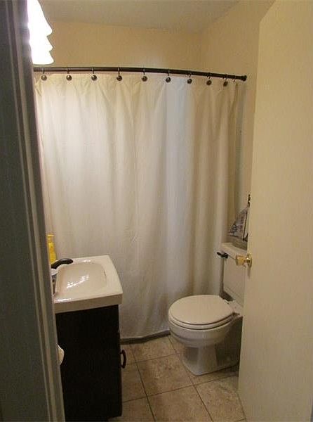 Full bath with newer fixture
