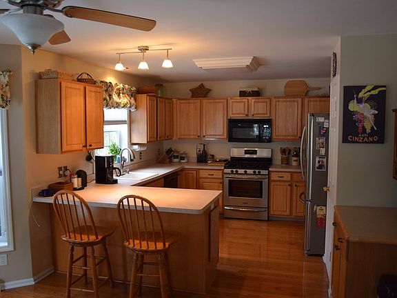 Kitchen
						:
						Open plan flowing into dining nook and family room