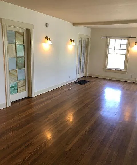 Left side Living room w/ both bedroom doors