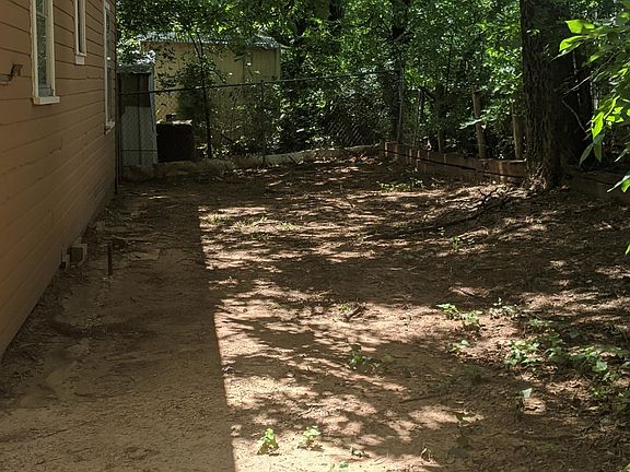 Rear of house, fenced for kids/pets.