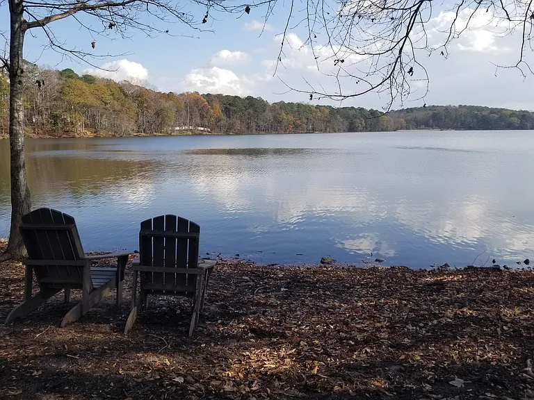 Relax in the Adirondack chairs on the banks of Lake Peachtree (4 miles; 8 minutes). View from Drake Field area.