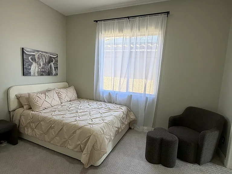 Alternate view of bedroom with natural light