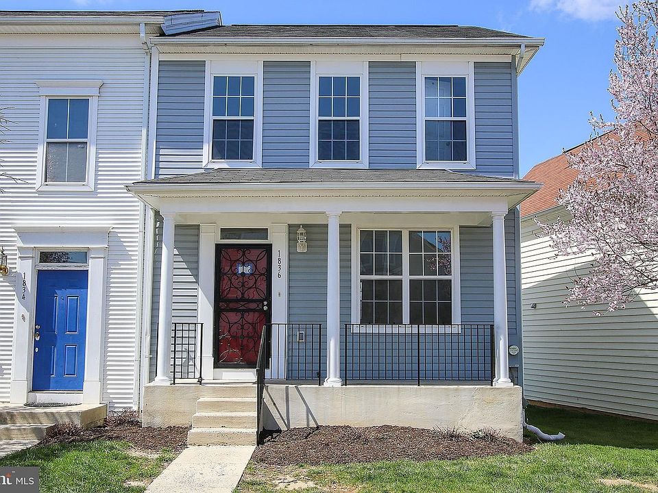 Front of house, garden plot, front porch.