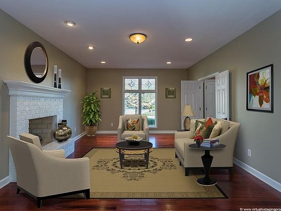 We have virtually staged the formal living room so you can see what a wonderful room this could be.