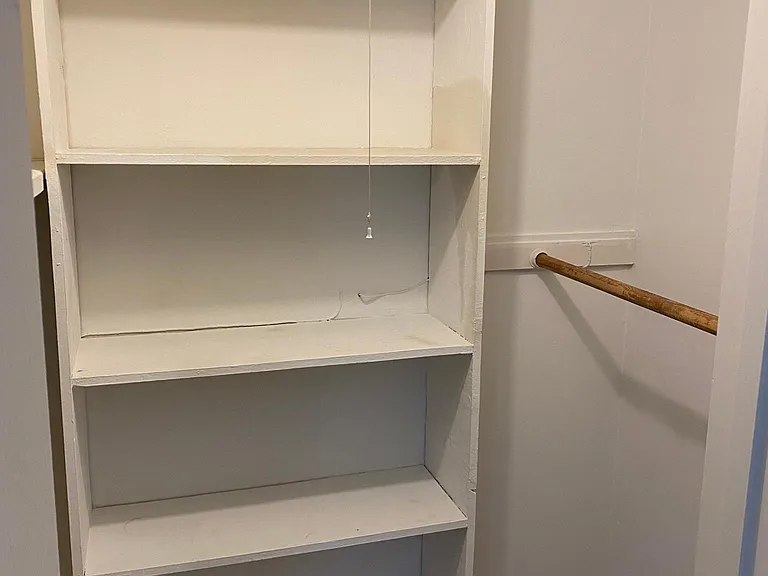 Master bedroom wall in closet
