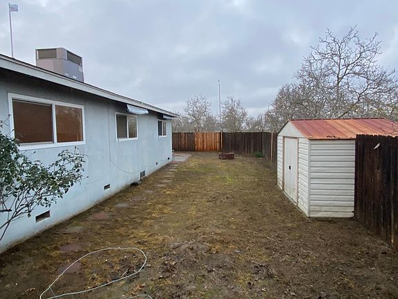 Back yard with shed for storage