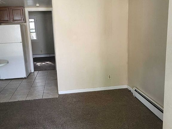 4th image of 211 E 9th St APT H