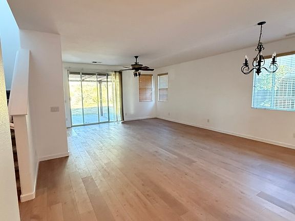 Living room and dining room with new LVP flooring