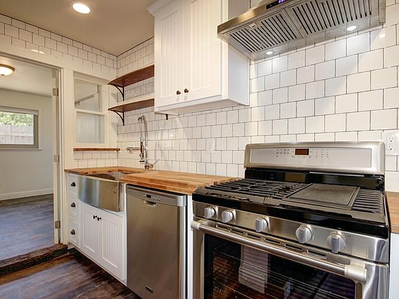 gas range, dish washer, and commercial vent hood