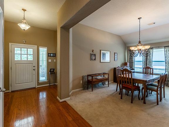 Upon entrance the dining area is open to the door creating an open feeling plaza to the house