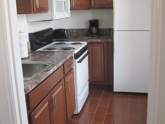 new kitchen with granite counter tops.