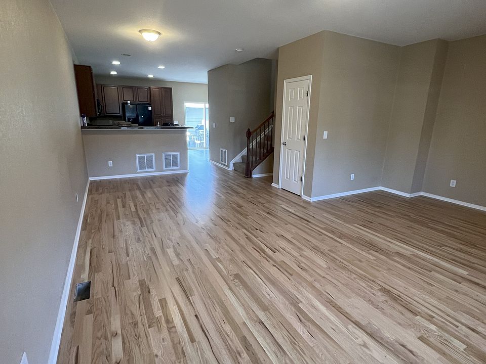 Open floor plan on the main level. New hardwood floors