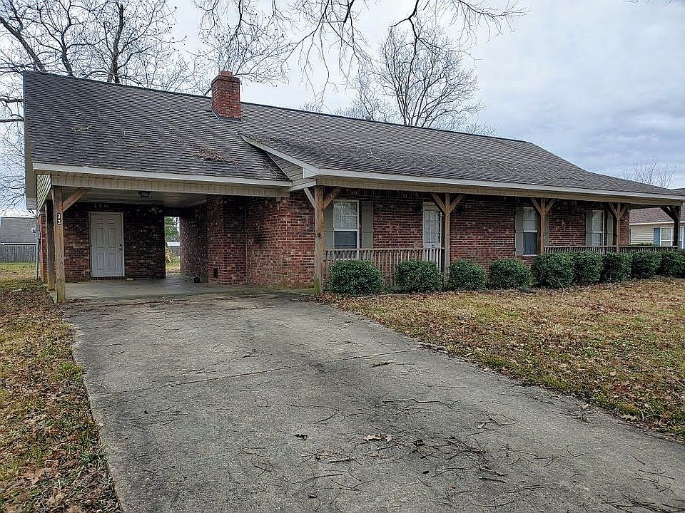 Front of home with carport