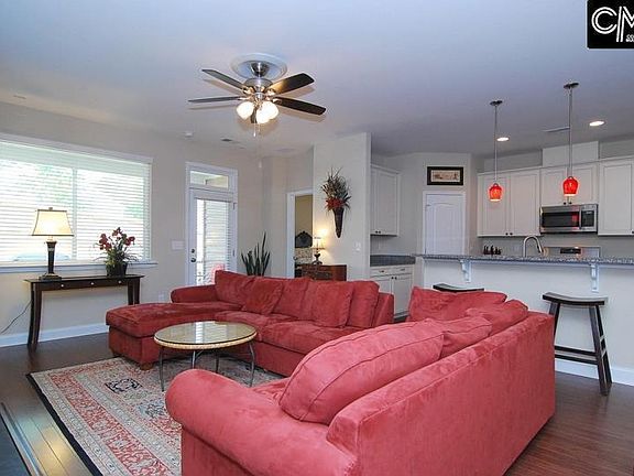 Open living are with door to screened porch