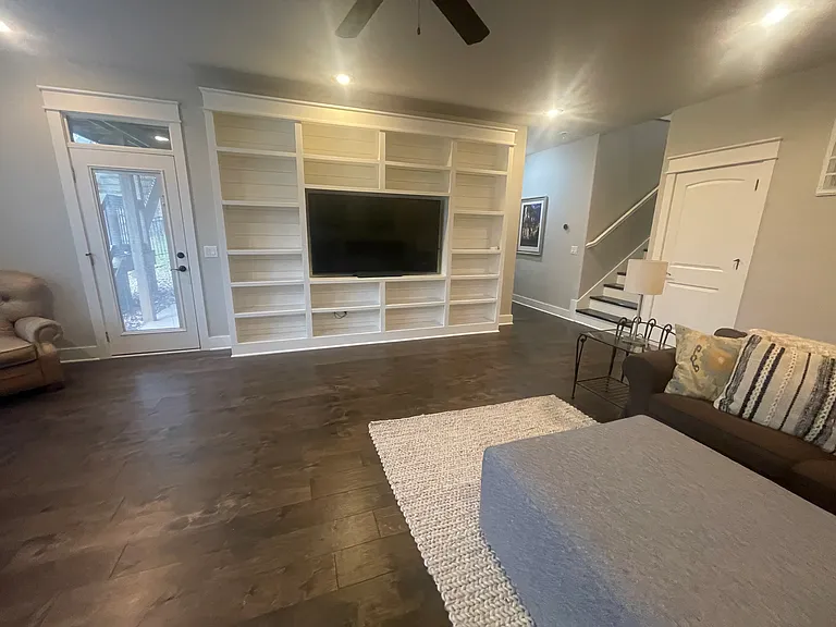 Lower level family room with built in entertainment center