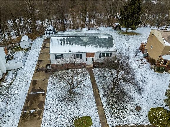 Aerial view of the home and its surroundings.