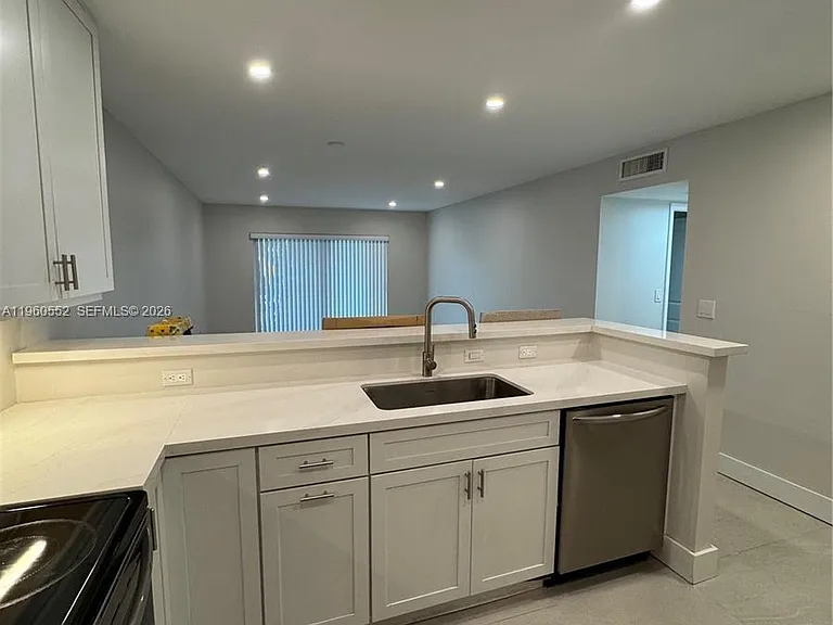7810 Camino Real #I-104 — Photo 2