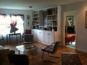 living room, view of built in cabinet and bookcase