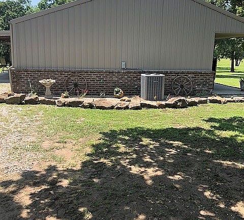 side view of home on 20ac