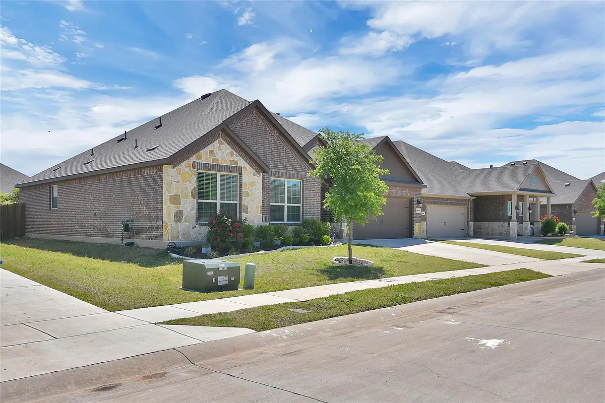 Front of Structure
View of front of home with a front yard and a garage - 2820 Permian Rd