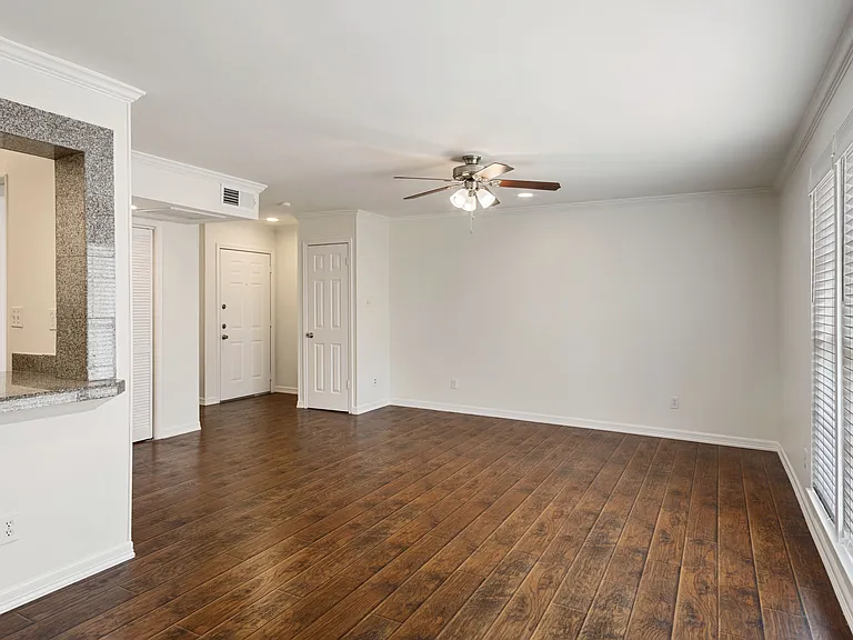 Coat closet by the front door. Additional closet in the hallway.
