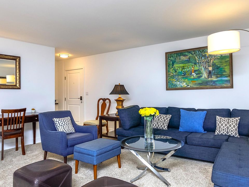 Spacious Living Room with Large Sectional and 3 Desk Work Spaces