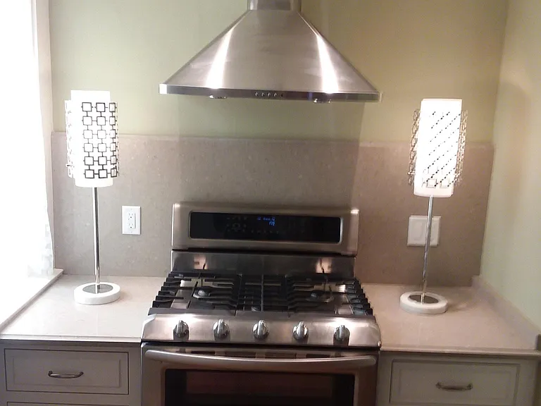 Gas Range and Stainless Steel Hood
