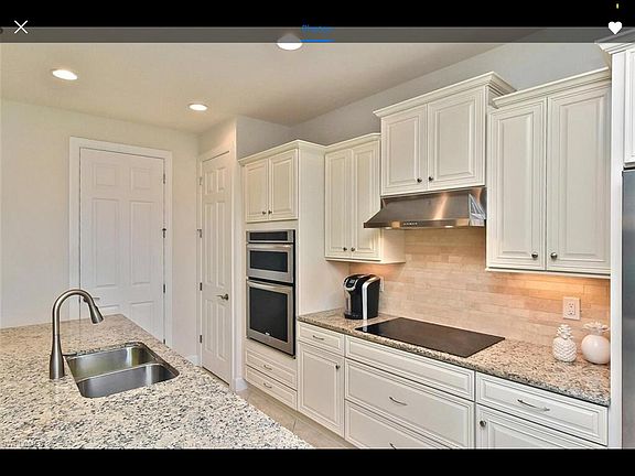 Kitchen with pantry and laundry room is behind 2nd door