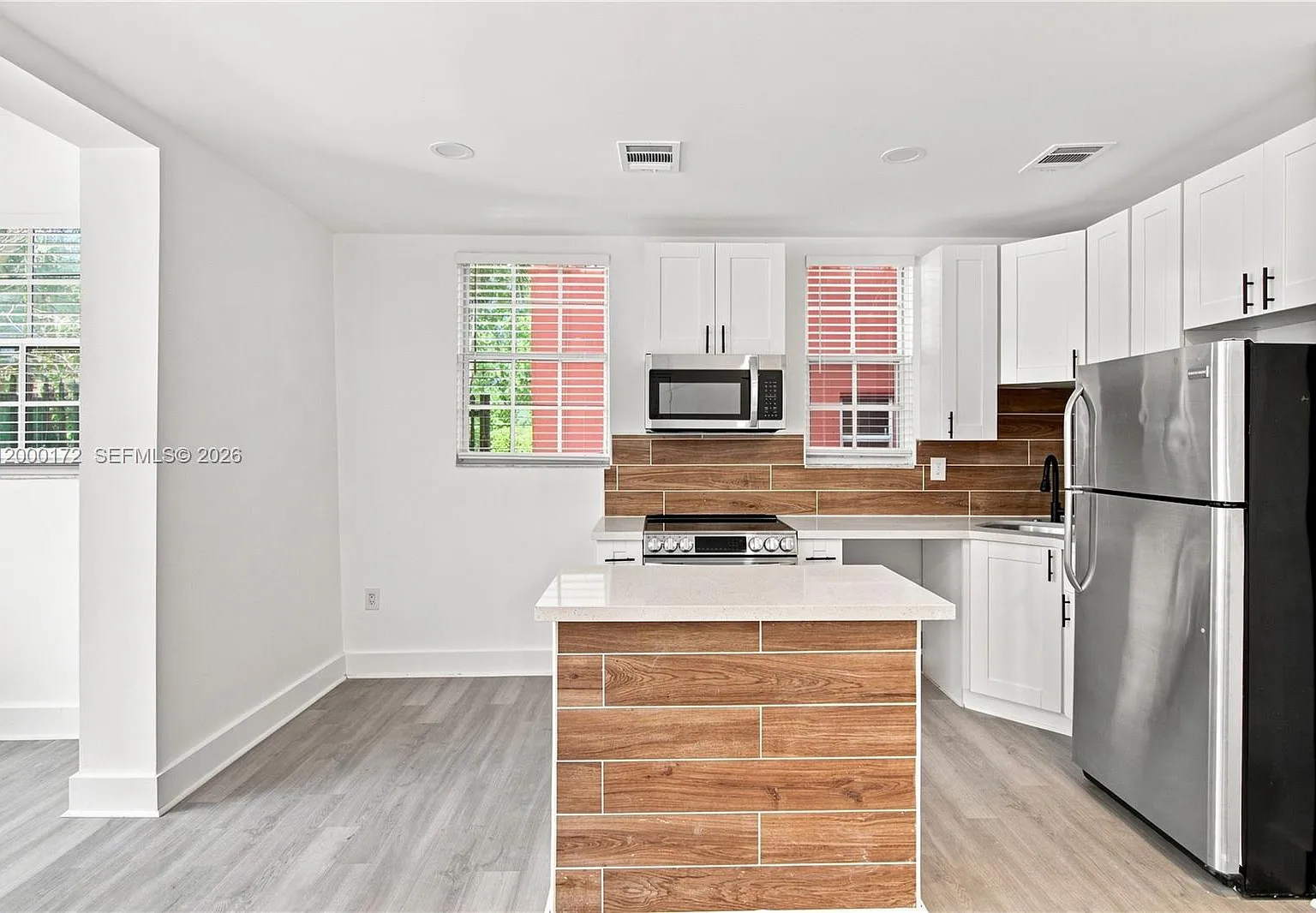 Midtown Condominium On 62 — Photo 2