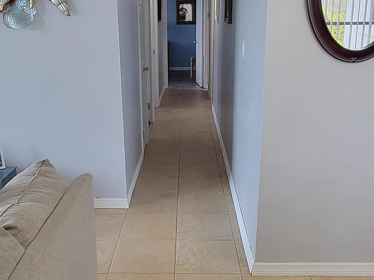Hallway to bedrooms and bathrooms