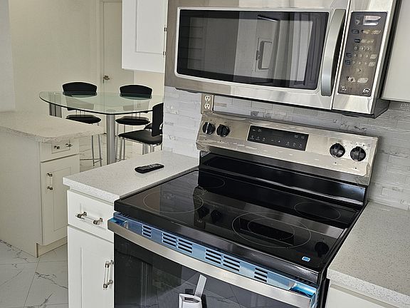 5th image of 108 Gardens Dr APT 204