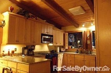 Kitchen
						:
						The remodled kitchen has maple cabinets granite counter tops.quiet dishwasher,