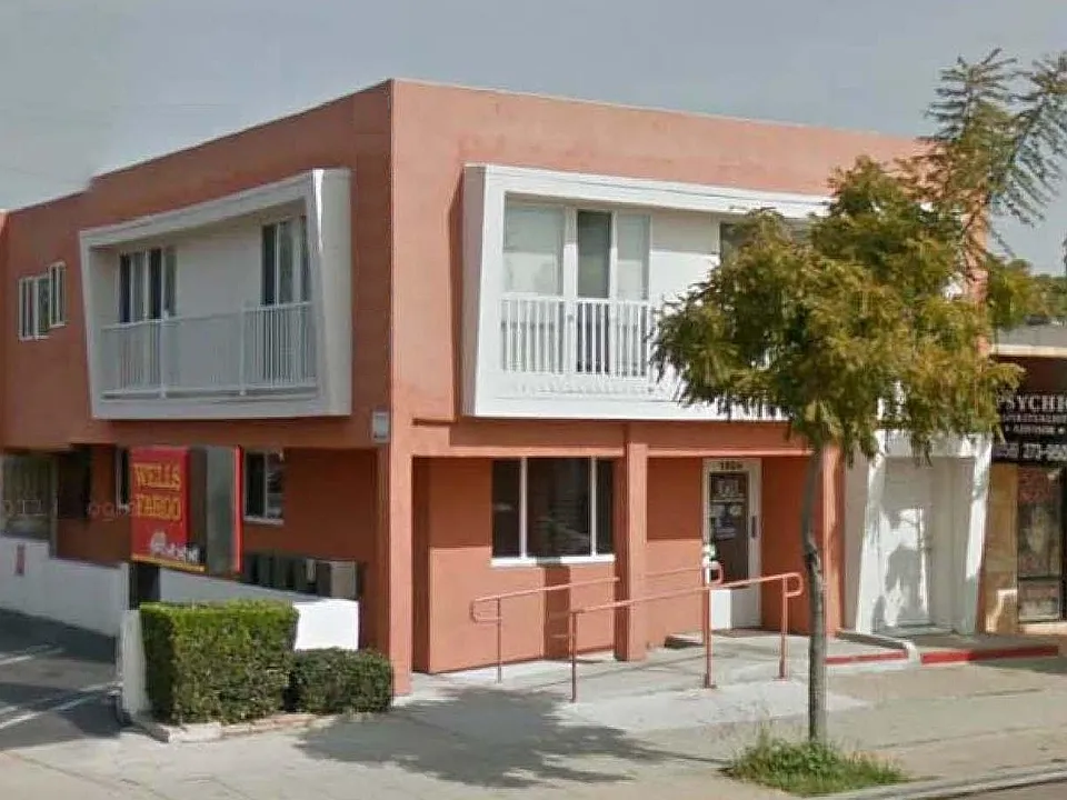 Outside view of apartment building (east of the local Wells Fargo Bank)