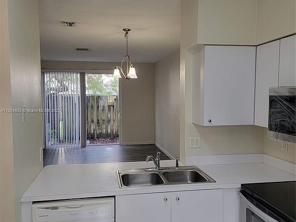 2nd image of 835 NE 212th Ter APT 5