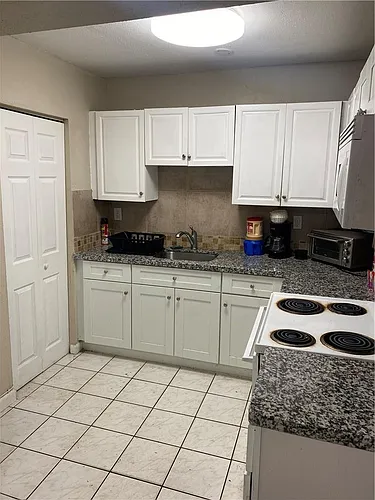 5701 NW 27th Ct Photo 1