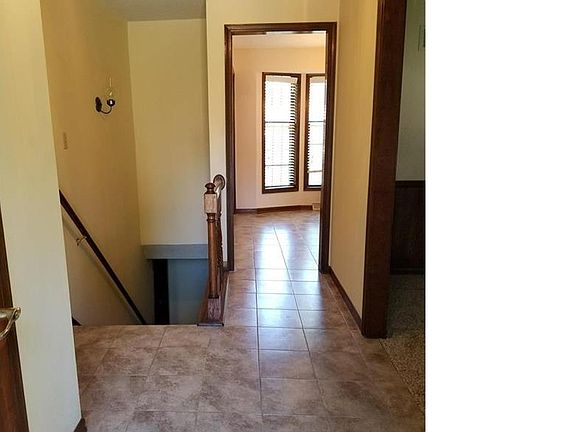 All tiled entry, kitchen and baths