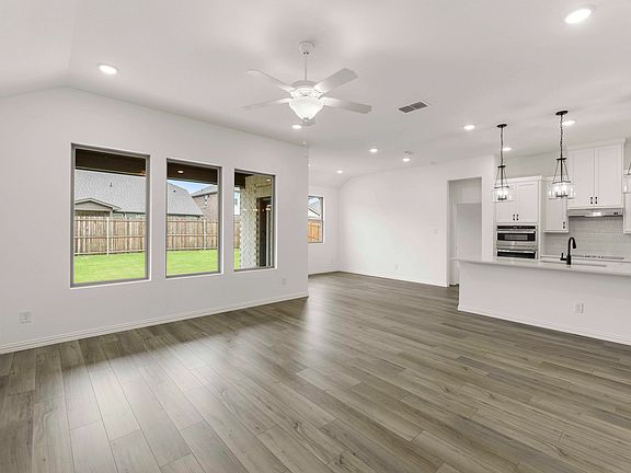 Open Kitchen-Living-Dining Room Representative Photo featuring the Harmony Collection