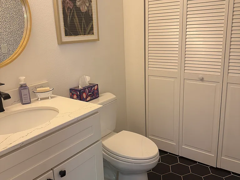 Updated Powder Room off the Kitchen with Laundry.