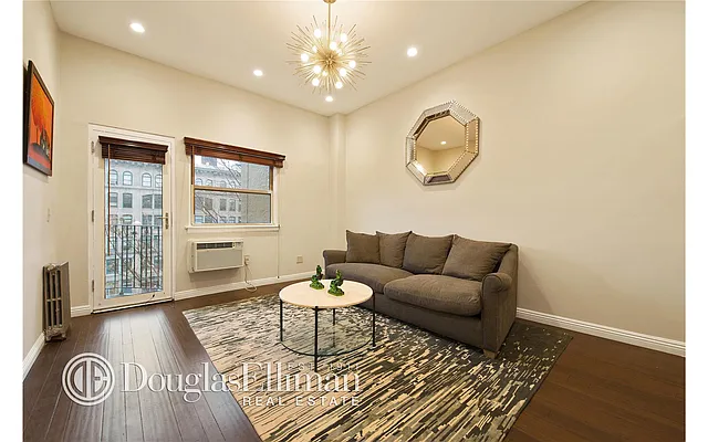 Sold by Douglas Elliman | media 12