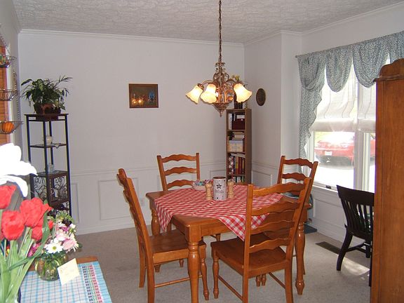 Dining Room w/pass window to kitchen