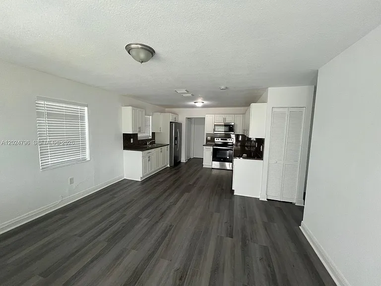 2561 NW 18th Ct — Photo 2
