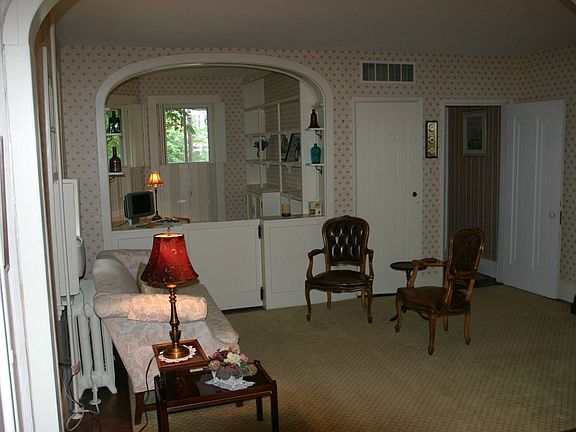 living room with office nook