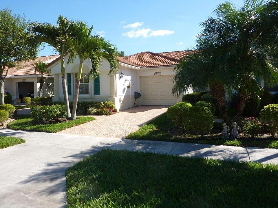 The frontyard features lovely landscape