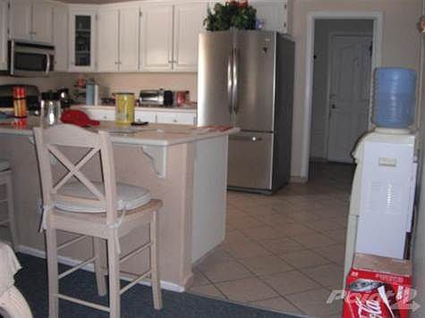 open kitchen with nice kitchen tile flooring