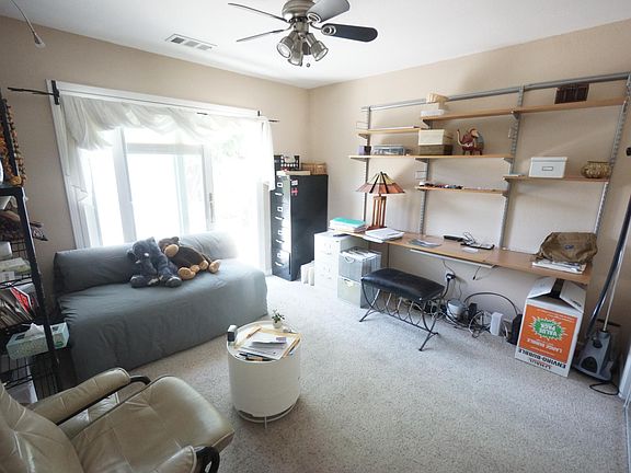 Bedroom 4 with sliding glass door to deck