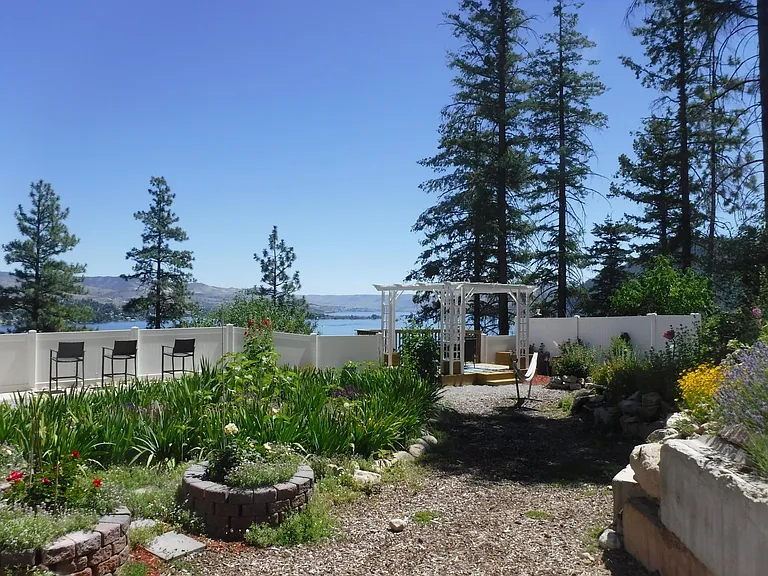 Rear gardens looking toward Pergola Deck and lake.