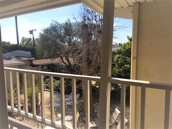 View outside front door at courtyard