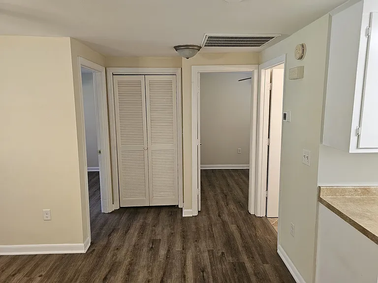 hall closet and the 2 bedroom entrances