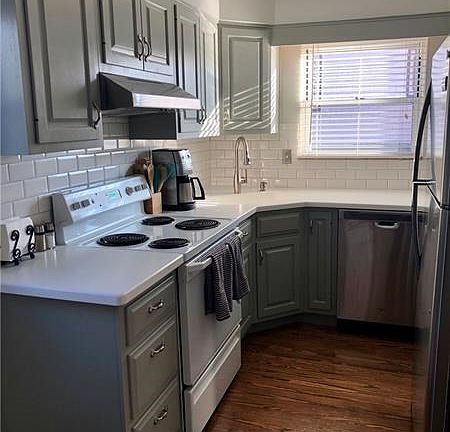 Updated kitchen with access to back deck