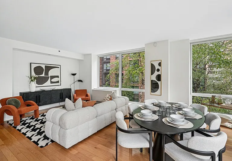 Step into Arbor, where modern elegance meets comfort. This inviting living space features large windows, stylish decor, and a cozy atmosphere perfect for both relaxation and entertaining. Schedule your visit today to see it for yourself!